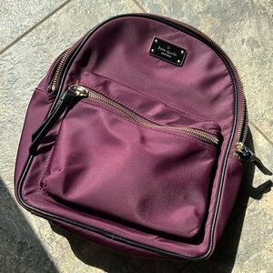 Kate Spade New York deep plum backpack